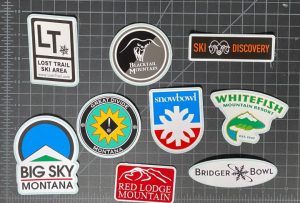 Nine stickers from Montana ski hills.