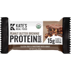 A Kate's Real Food Peanut Butter Brownie Protein Bar with 15g of plant-based protein.